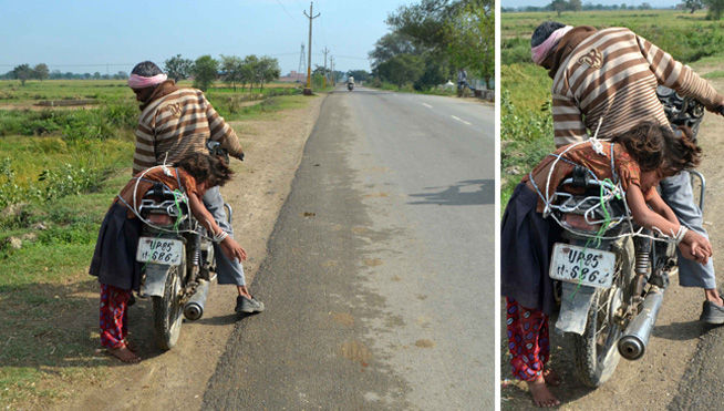 Detenido por llevar a su hija atada con cuerdas a su moto